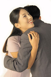 Colleagues hugging