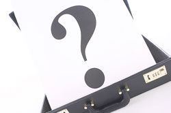 Large question mark in briefcase