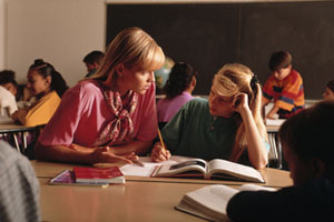 Teacher formatively assessing a student's understanding