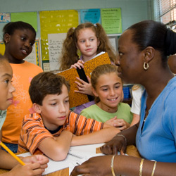 Teacher performing formative assessment.