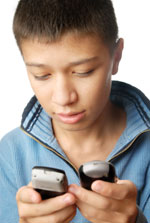 boy holding cell phones