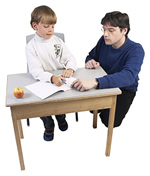 Teacher helping young student make a choice