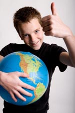 boy holding a globe